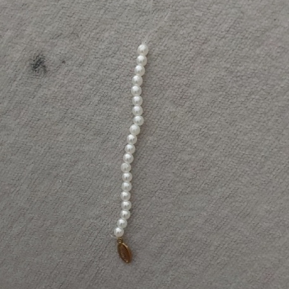 Elegant Pearl Bracelet with Gold Charm